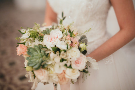 Bride with wedding bouquet from Hello Flowers!